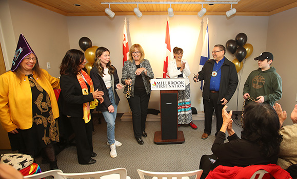 Bob Gloade, chief of Millbrook First Nation (second from right), and Karen Pictou, executive director of Nova Scotia Native Women's Association (third from right), cut the ribbon at an opening ceremony Wednesday. (Nick Pearce photos)