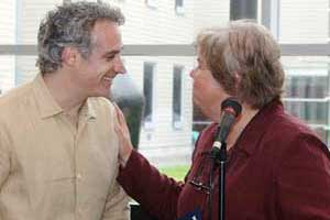 Dean Marian Binkley congratulates Dr. Peter O'Brien