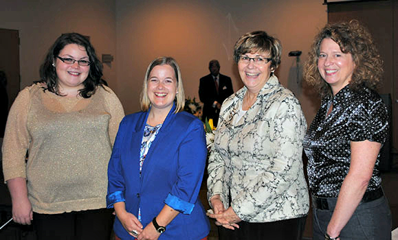 Danielle celebrates her award with Nursing colleagues (from L-R) Katie VanPatter, Dr. Kathleen MacMillan (Director) and Dr. Megan Aston.
