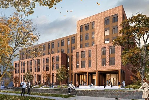 A brick building rendering is seek with students walking on the road in front.