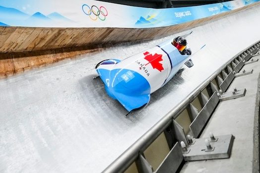 Mike Evelyn O’Higgins on the bobsleigh track (photo by Mark Blinch/COC).