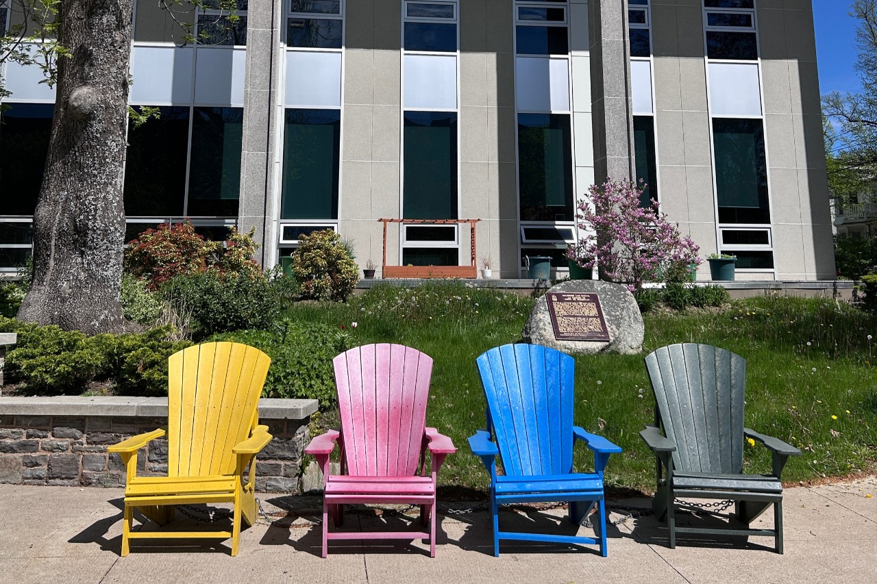 4 adirondack chairs outside Weldon Law Building
