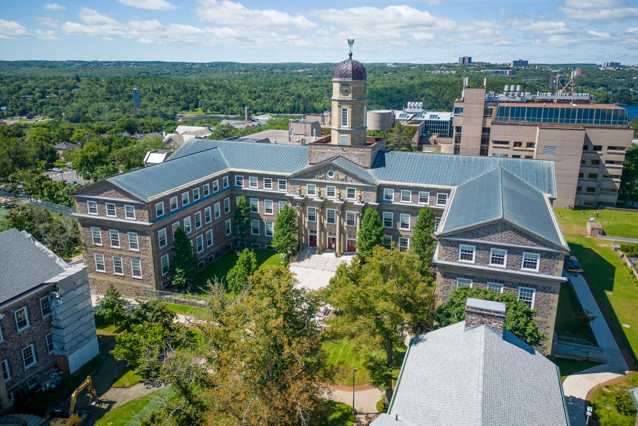 Henry Hicks building on a summer day