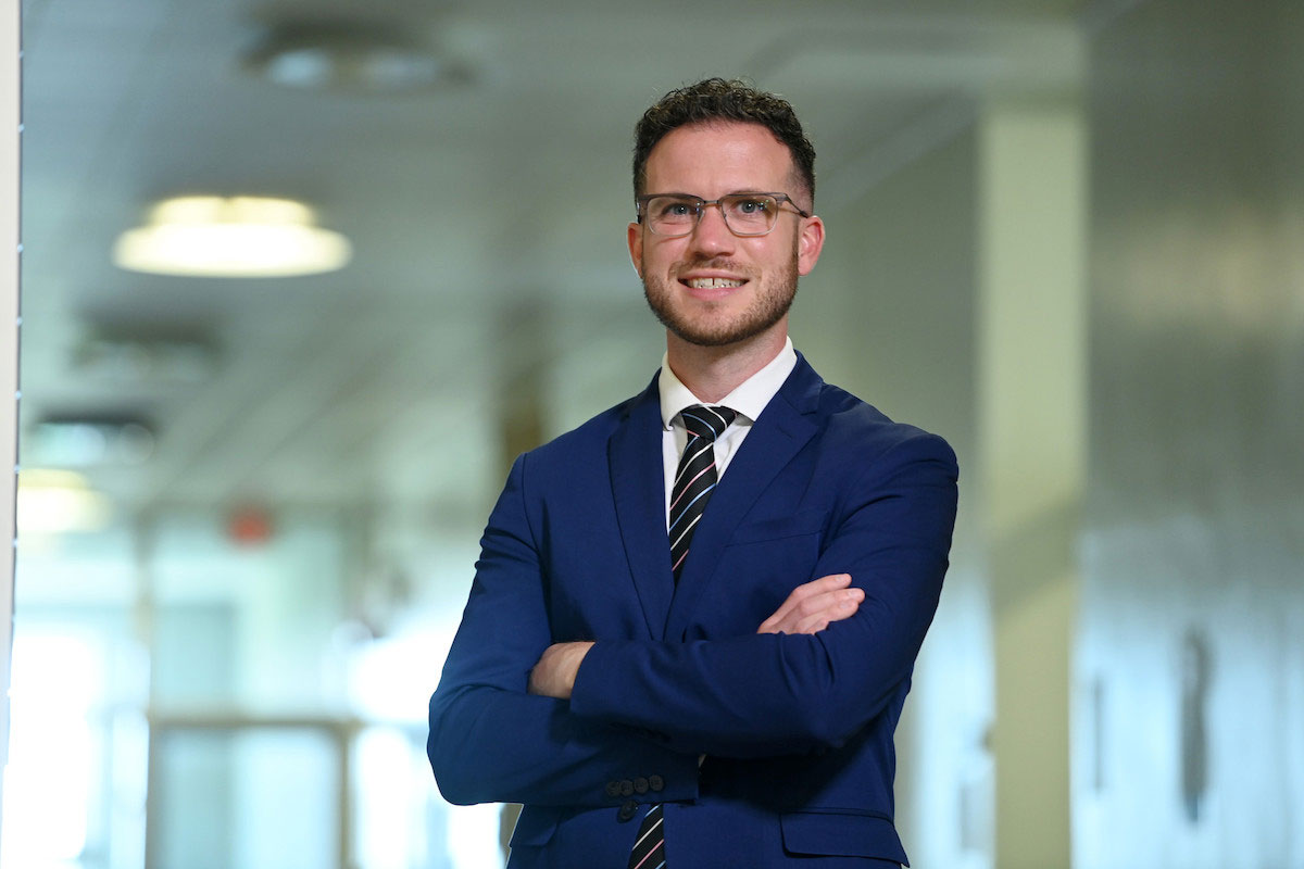 Rick Ezekiel stands in a corridor at Dal.