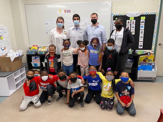 Dentistry students with grade one students. 