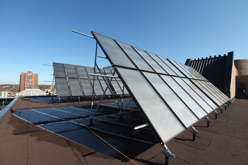 Angled solar panels on a rooftop.