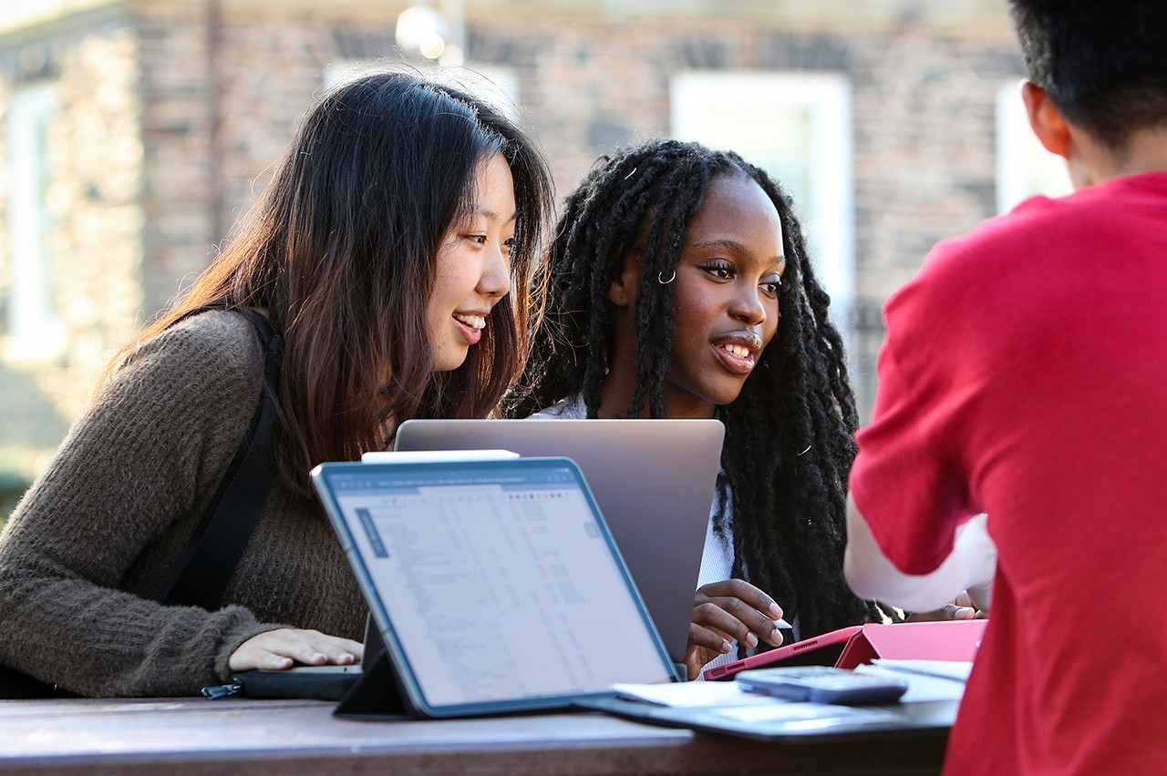 Dalhousie international students from Nigeria work together on campus 