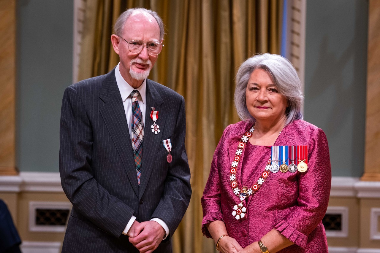 Dr. Allan S. MacDonald poses with Her Excellency the Right Honourable Mary Simon, Governor General of Canada, at a Order of Canada ceremony.
