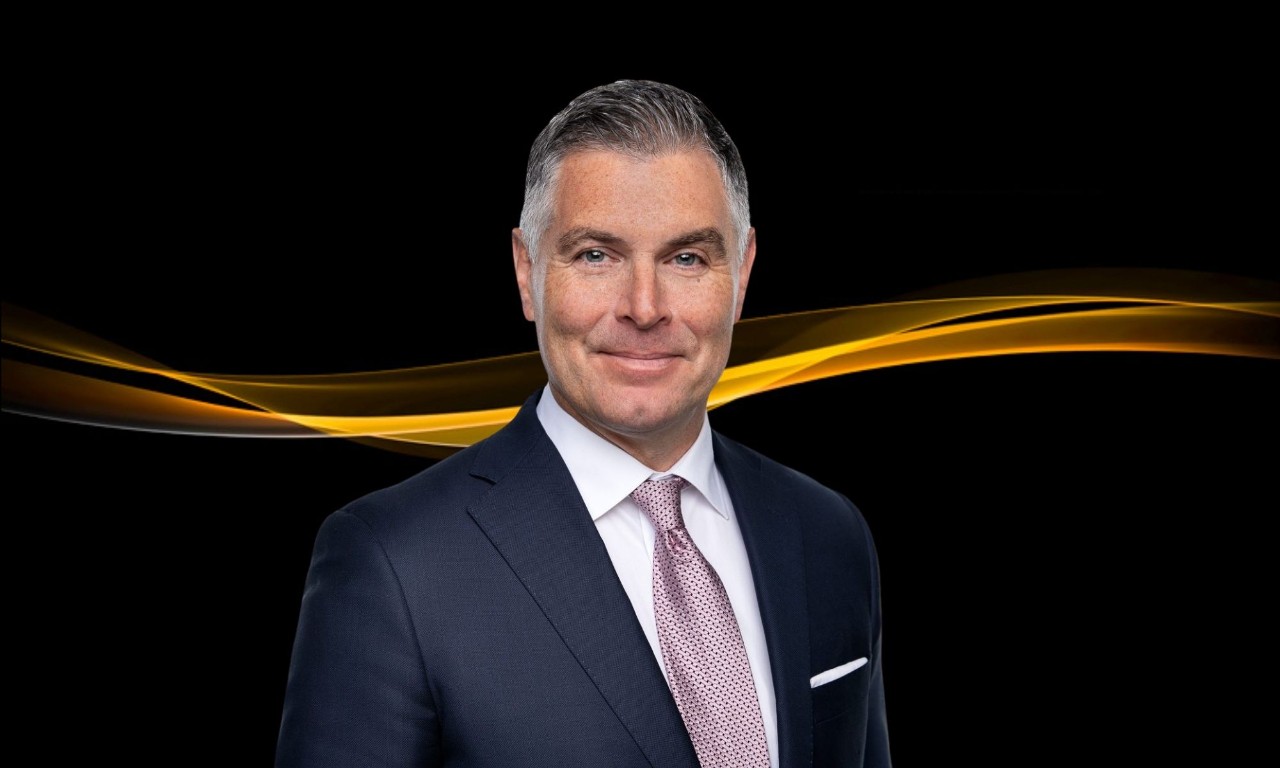 Clint Davis portrait with Aurum Awards gold branding.