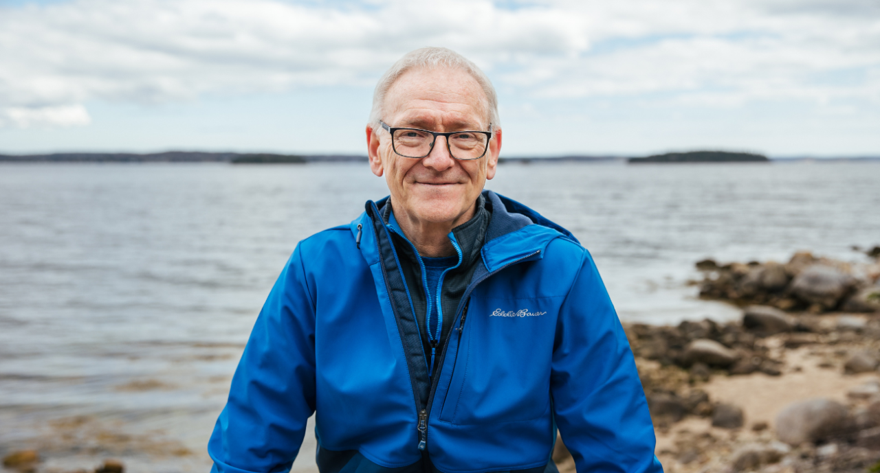 Geologist Fred Bonner stands outside near beach in rural Nova Scotia.