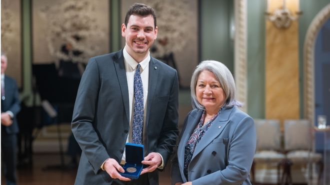 Carson and Simon posing at the event inside Rideau Hall.