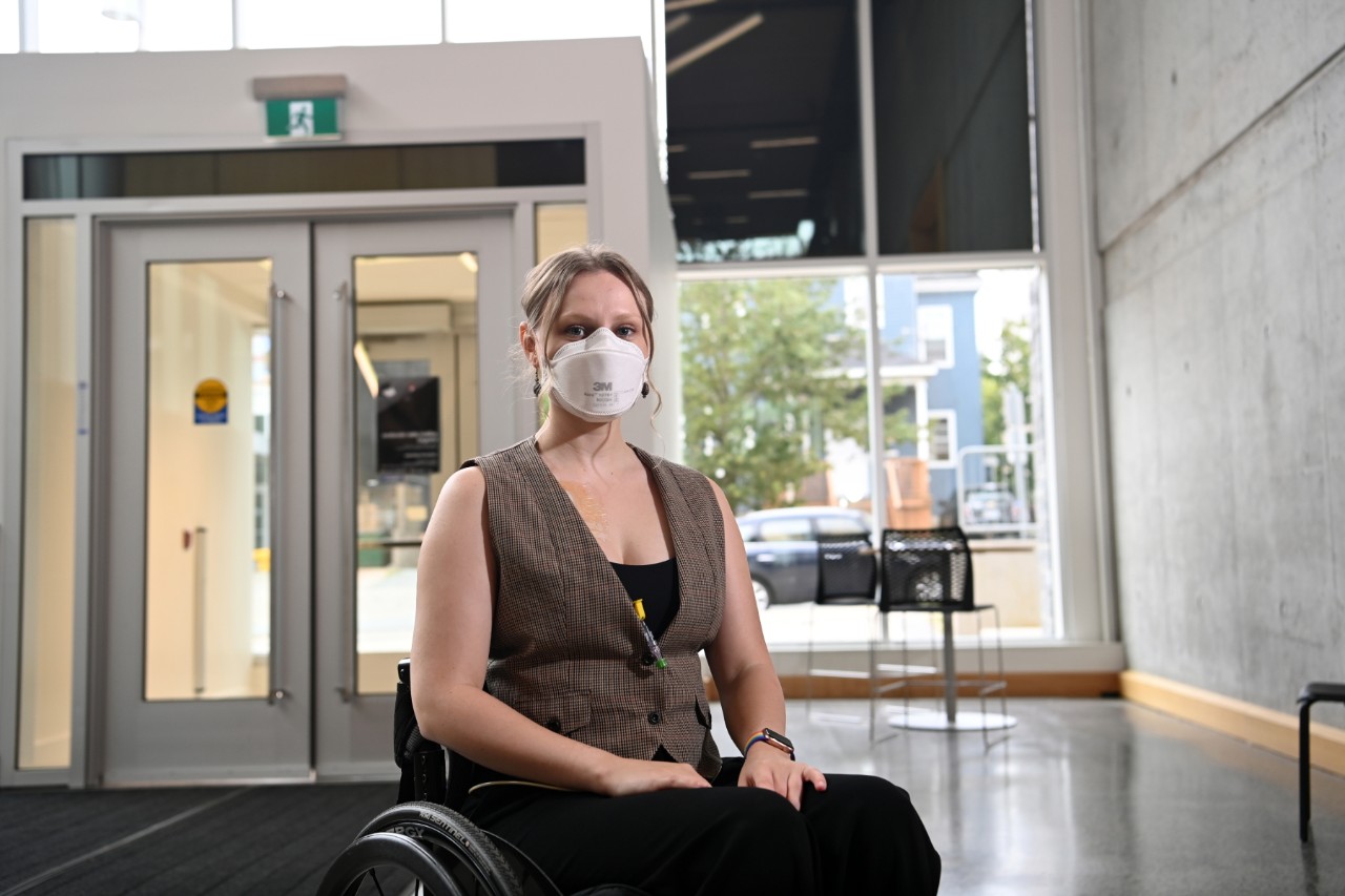 Taverner wears a mask indoors.