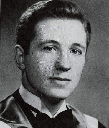 Black and white portrait of Don Hill on his graduation day in 1960.