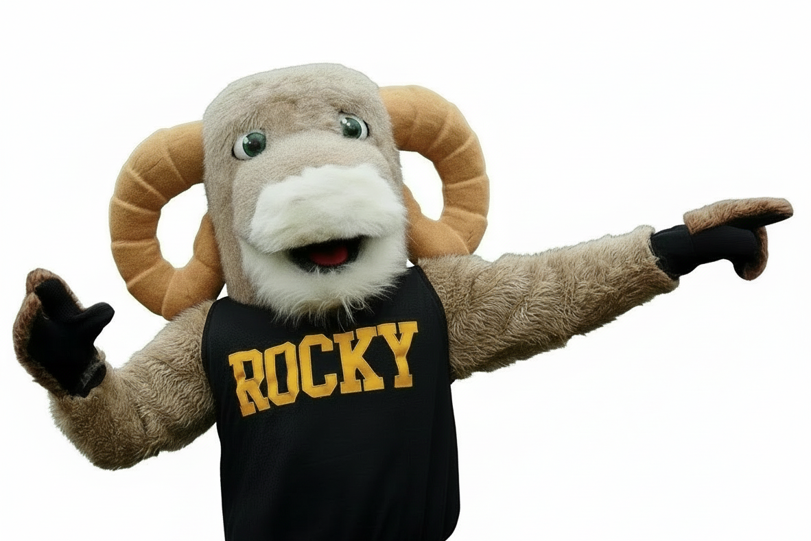 Ram mascot wearing a black shirt that reads "Rocky" in gold, pointing towards the right.