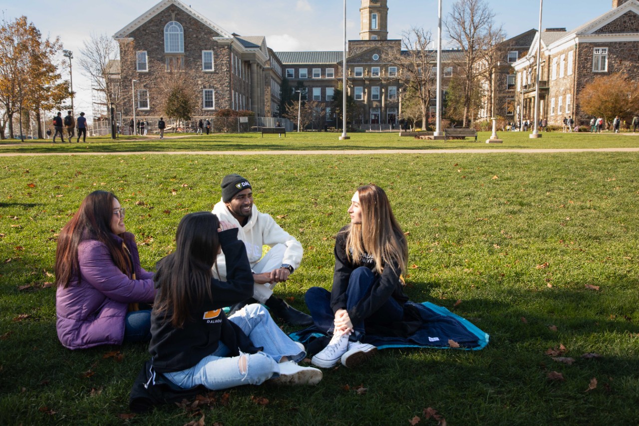students sitting on Studley Quad