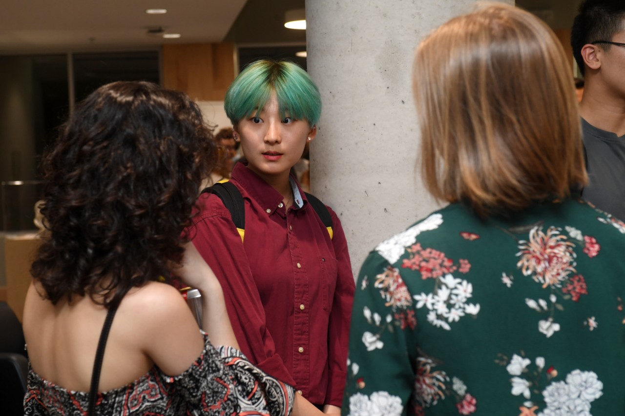 Students gather in a group to talk while they attend the Dalhousie Science welcome party