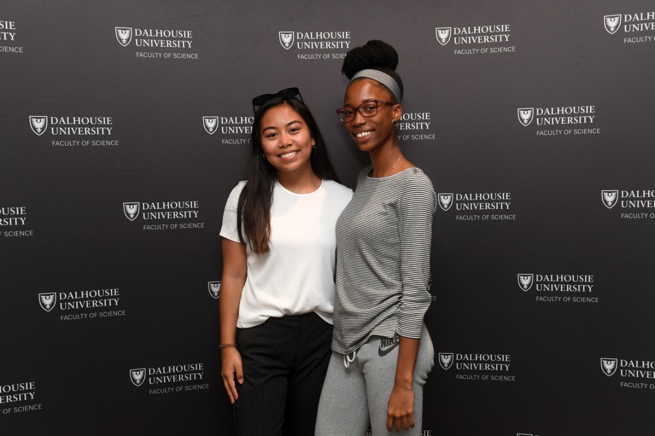 Student pose for a photo together while they attend the Dalhousie Science welcome party