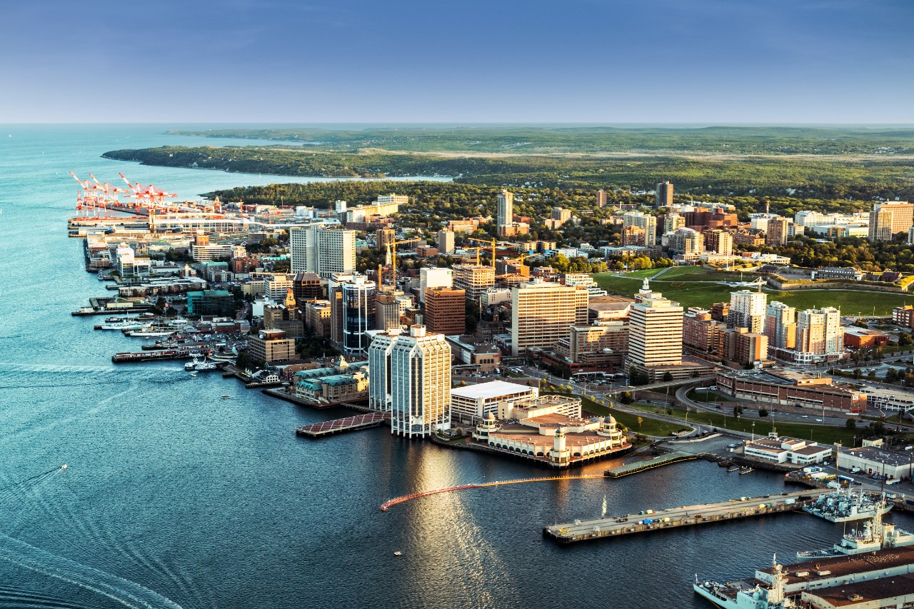 An aerial view of downtown Halifax and the harbour on a sunny day