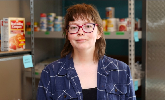 Alexe Indigo portrait in the food bank.