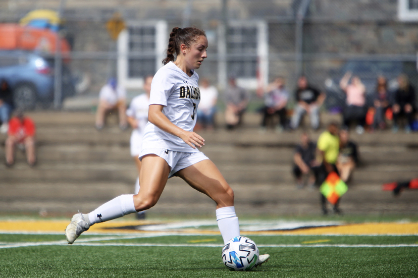 Chiasson in action on the soccer field with the ball.