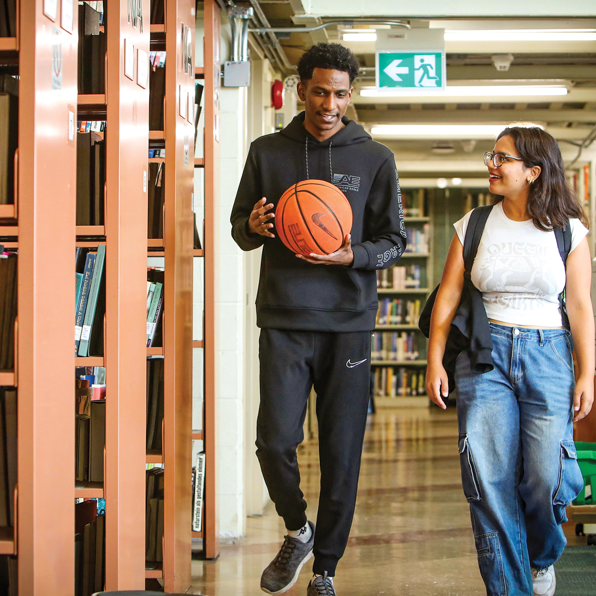 Two people walking through one of the Dalhousie Libraries