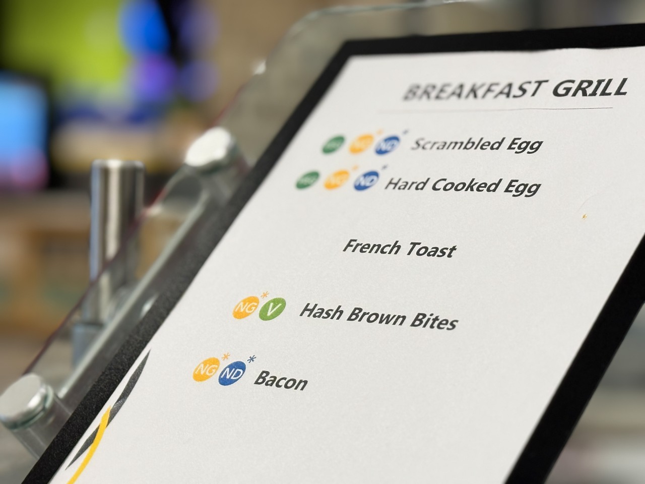 Signage for the breakfast grill shows food labelling next to each item