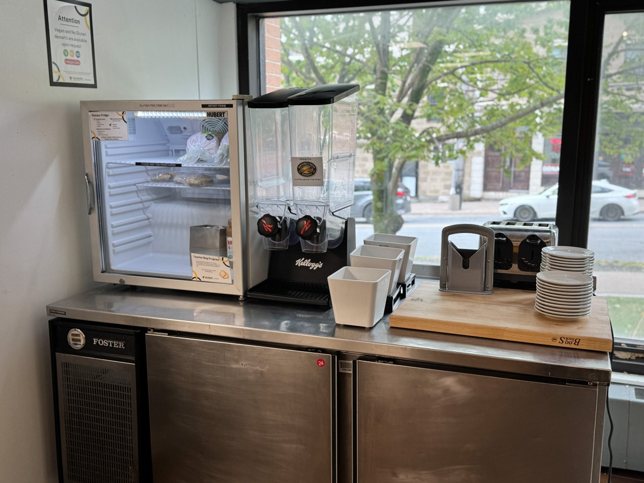 The no gluten station has a dedicated fridge, cereal dispensers, and toaster