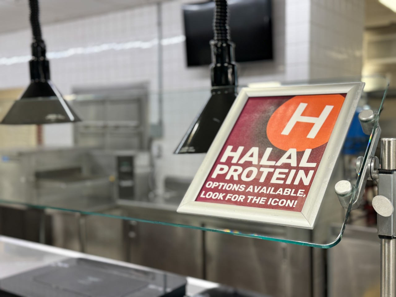 A sign at the serving counter indicated Halal items are available -- showing the icon to look for
