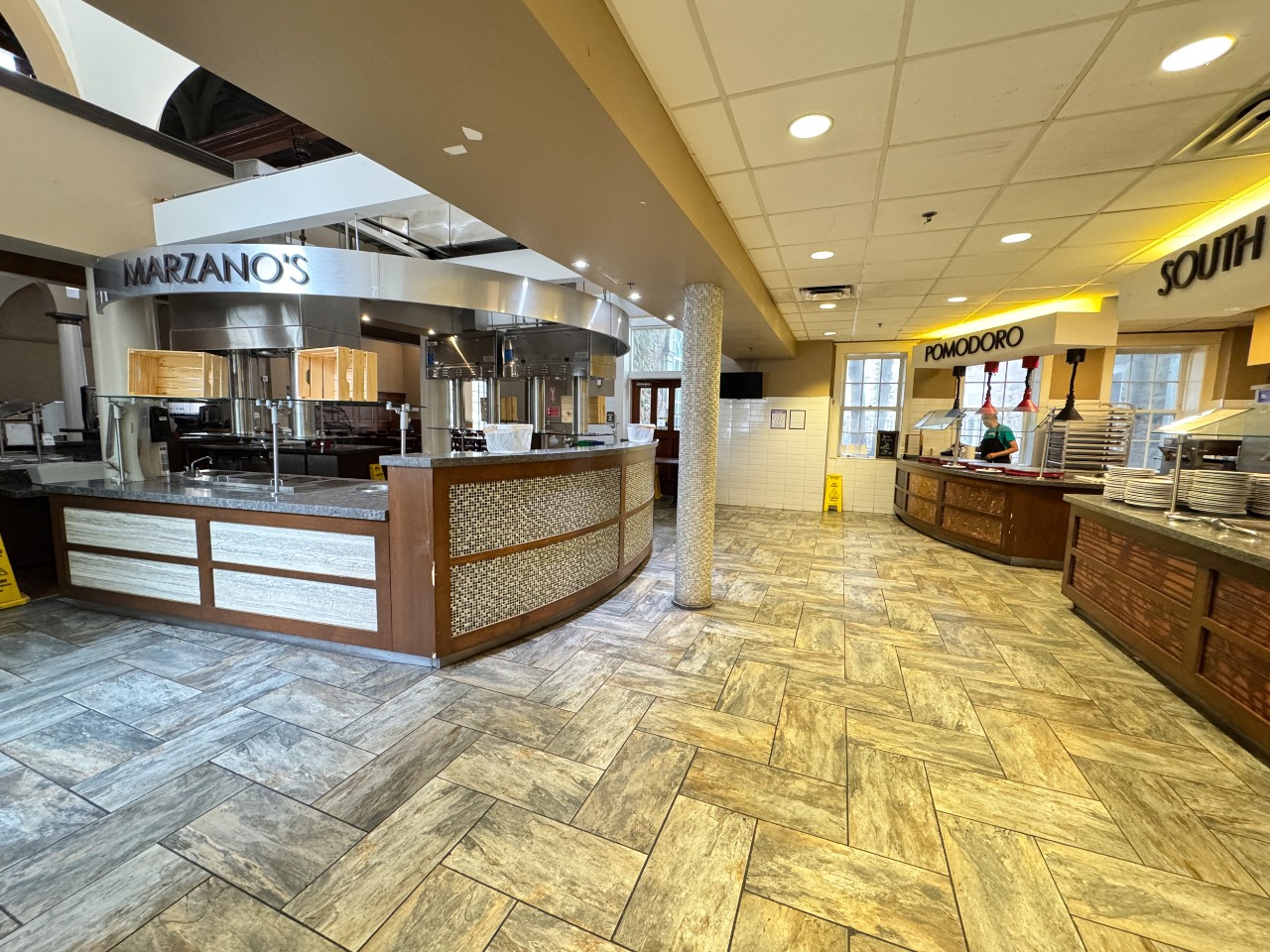 The servery has several stations that serve hot food options