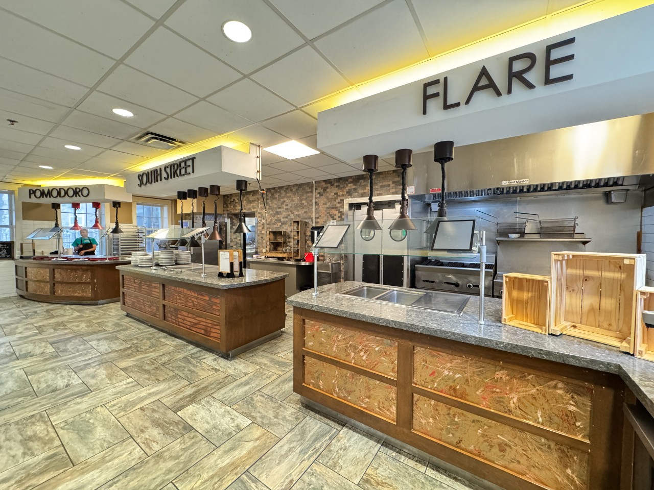 The servery has several stations that serve hot food options