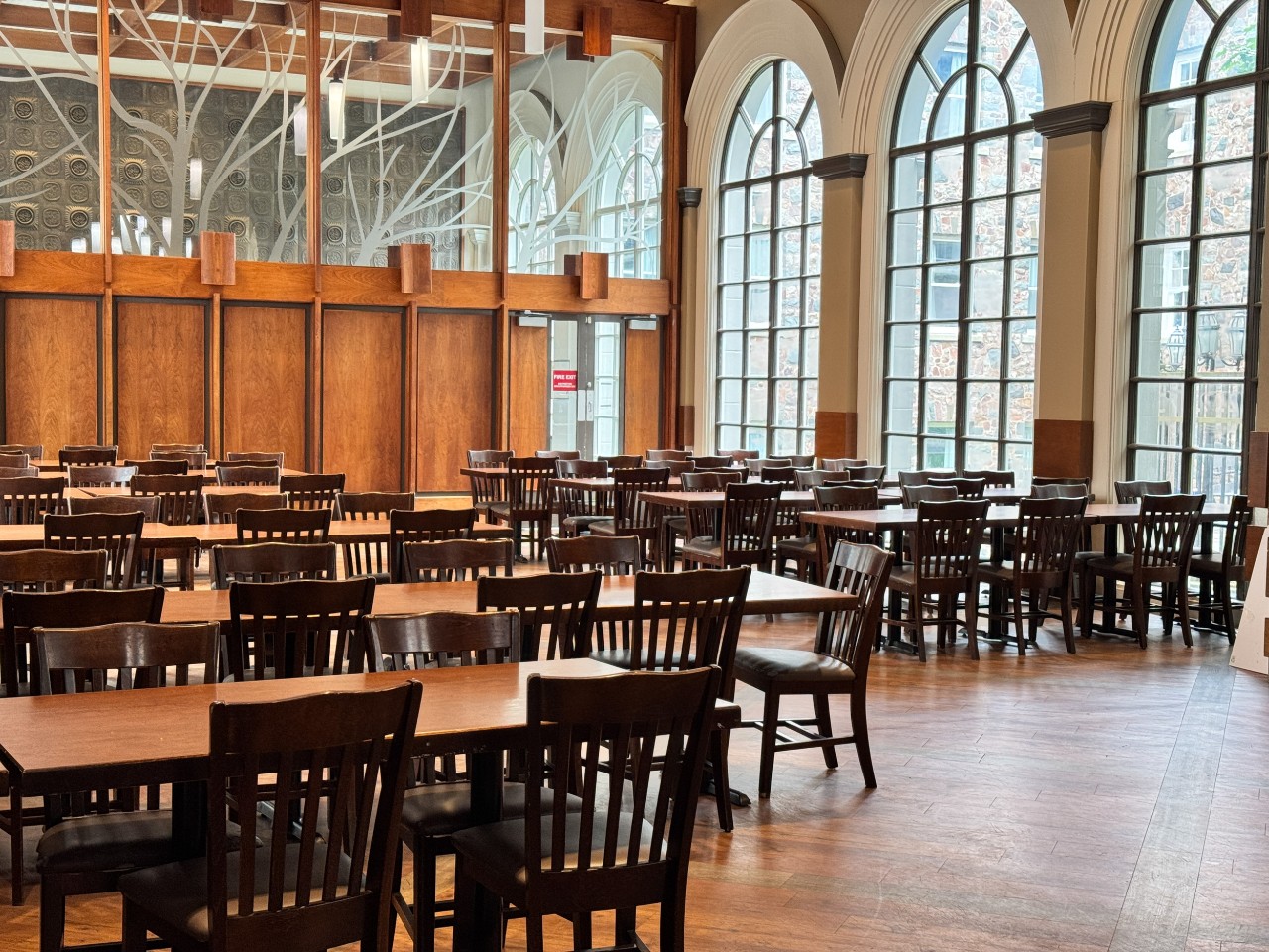 The seating in Shirreff dining hall is made of long tables with dark wooden chairs