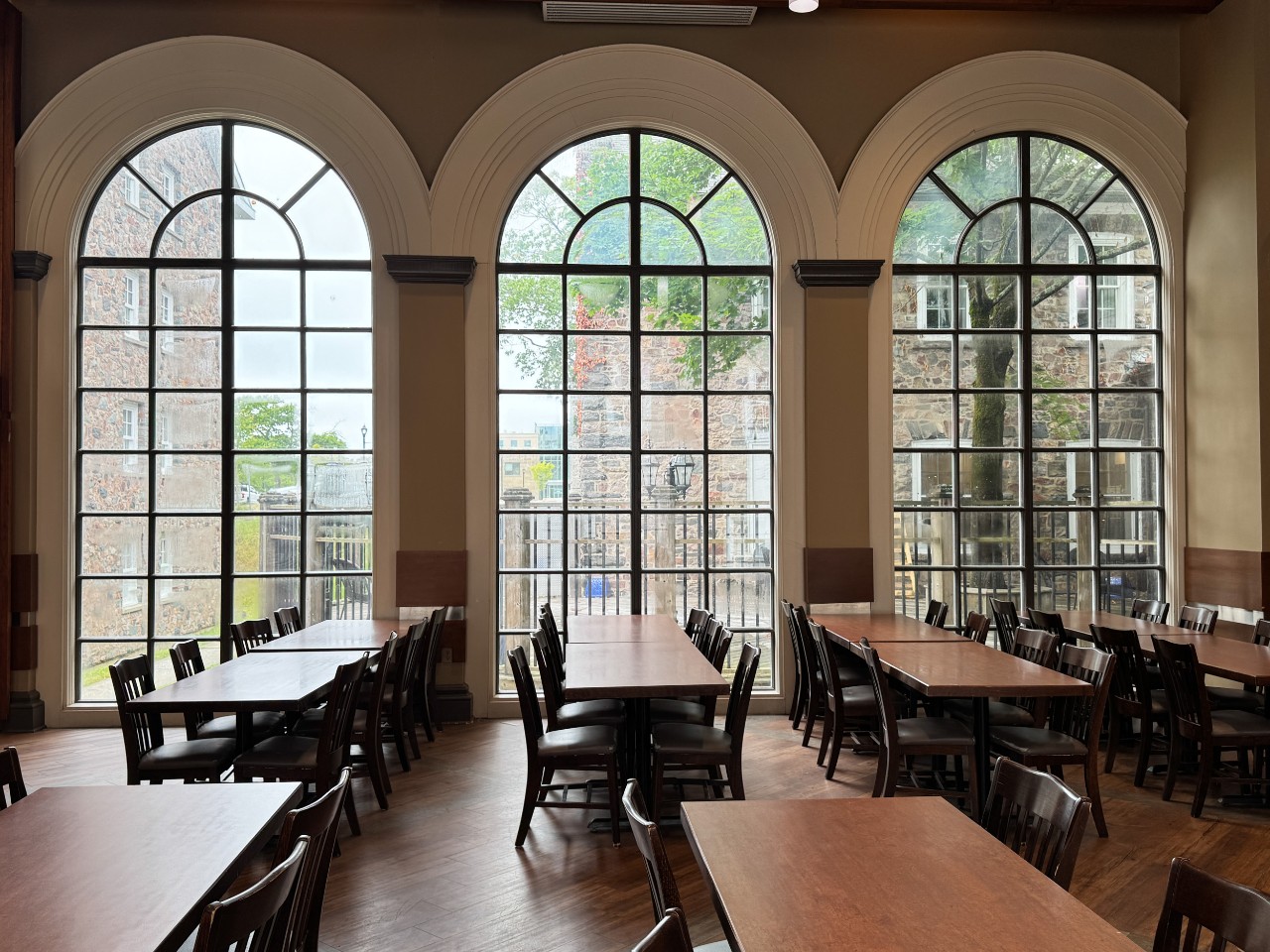 The seating in Shirreff dining hall is made of long tables with dark wooden chairs