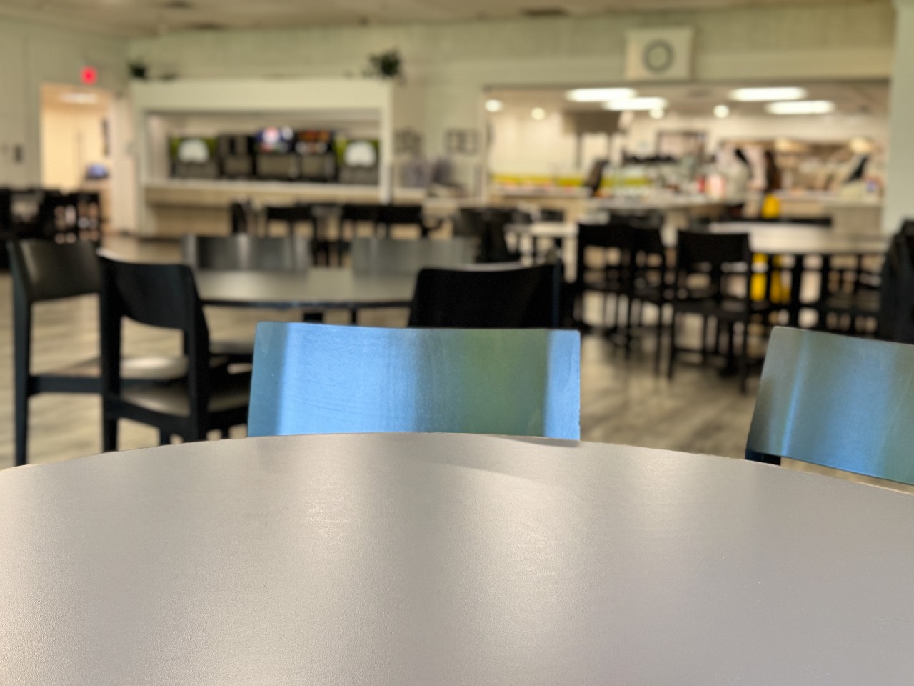 A close up of seats at a large table in the seating area