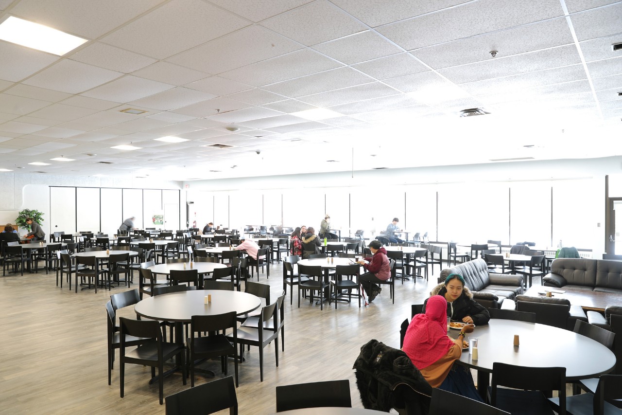 Students eating in the cafeteria at Jenkins Hall