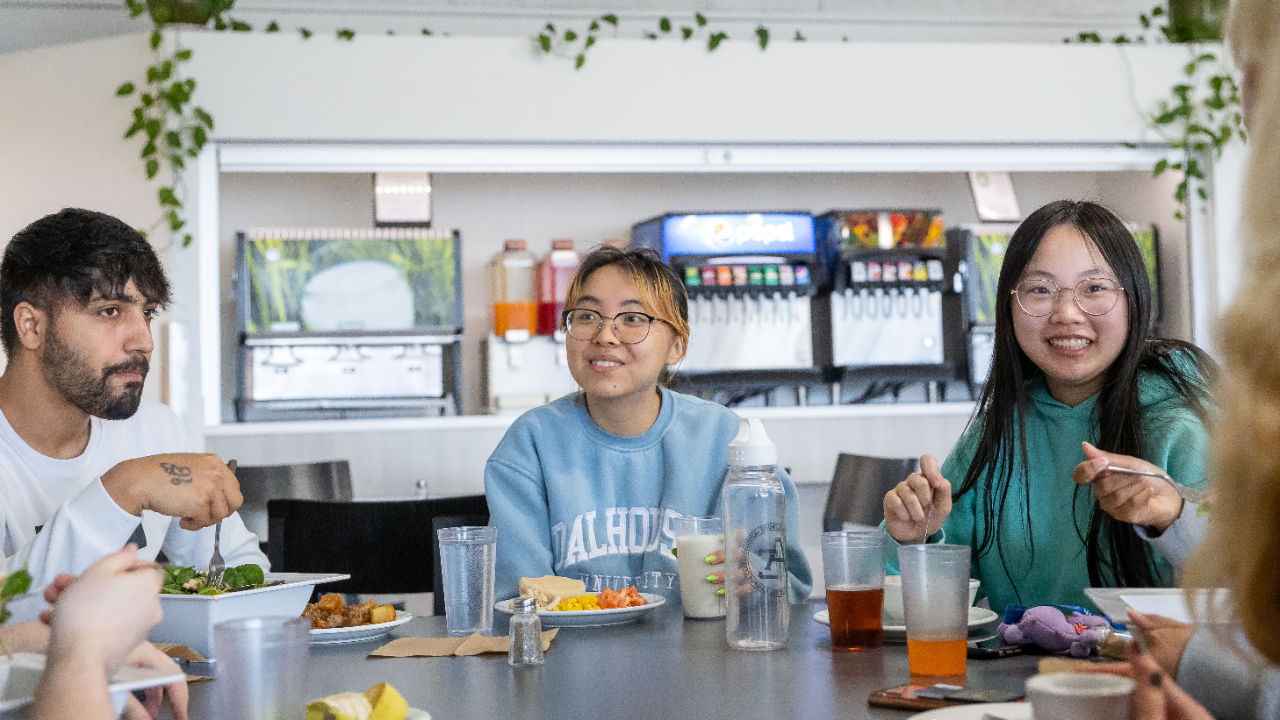 Students sharing a meal in the Truro cafeteria.