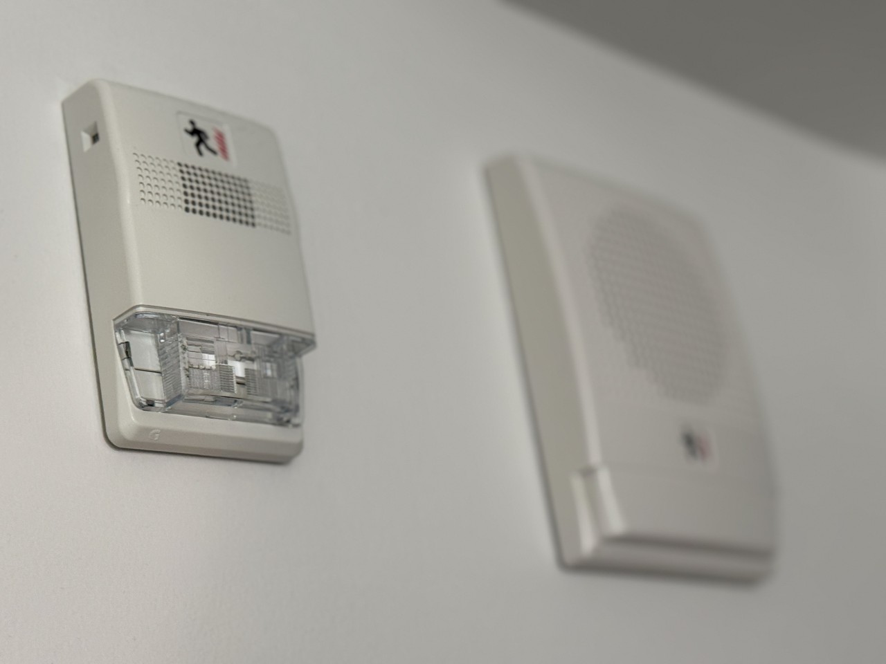 Emergency alarms on the all of an accessible room in LeMarchant Place - with audio and visual alarms