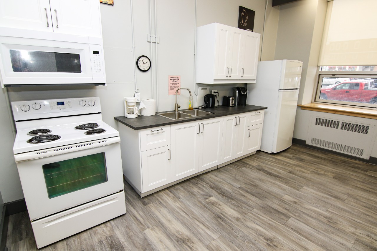 The kitchen in the main floor lounge has a full set of appliances