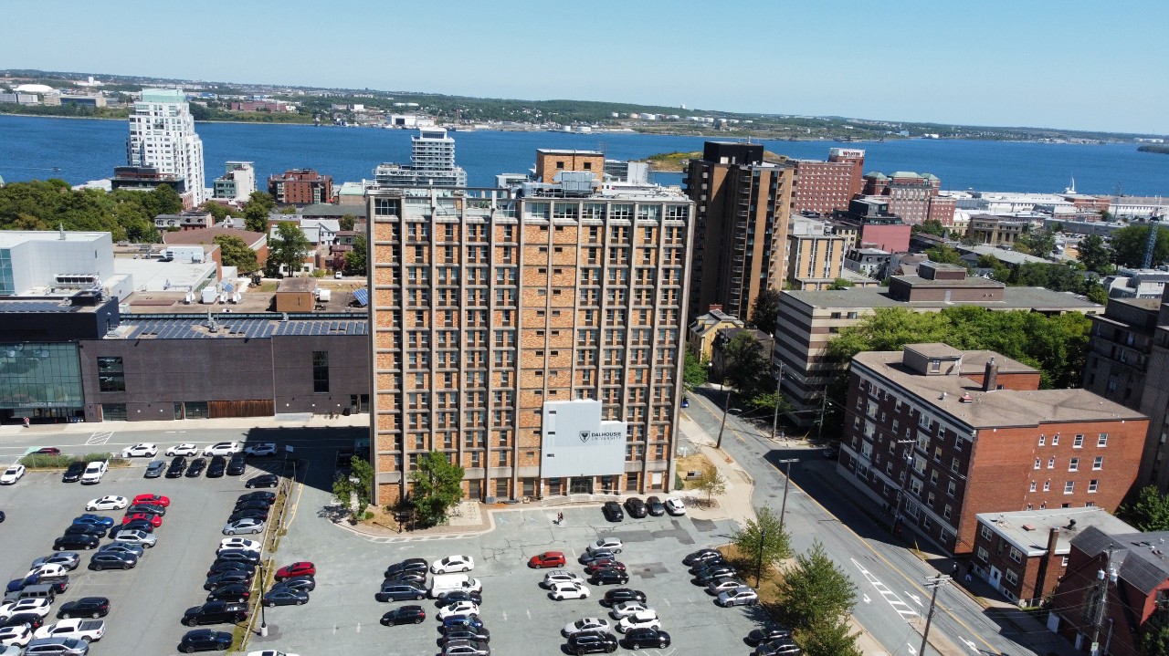 An aerial photo of Gerard Hall showing the harbour in the background