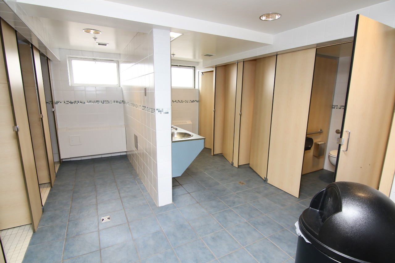 The bathrooms in Gerard Hall have showers with full height doors for privacy.