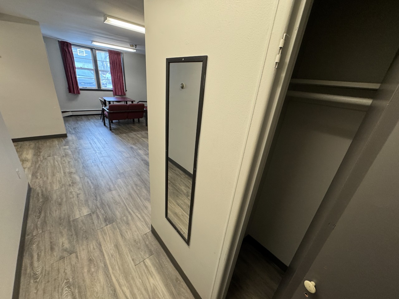 The front hall storage closet in a bachelor apartment in Glengary