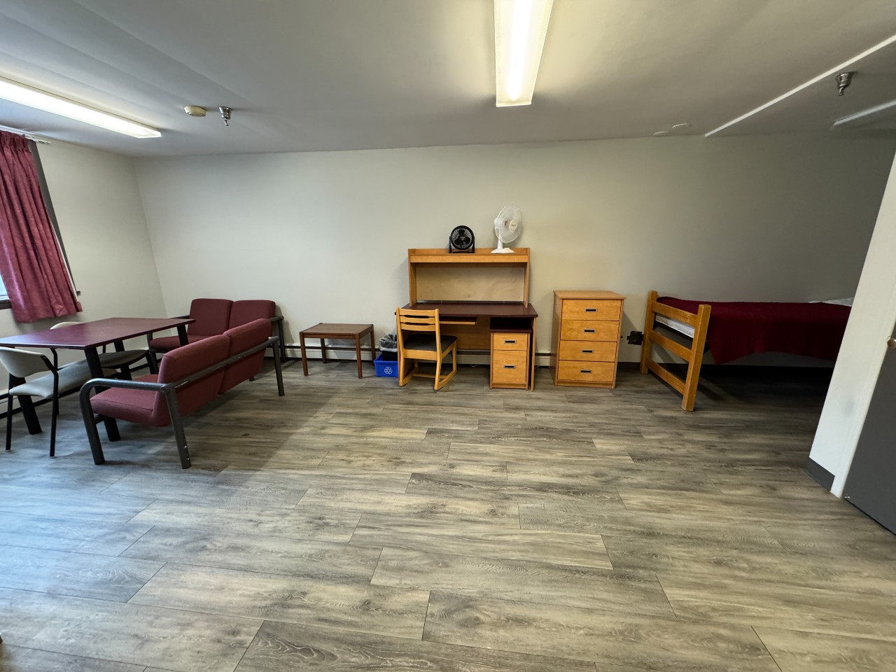 The large open living area in a bachelor apartment in Glengary
