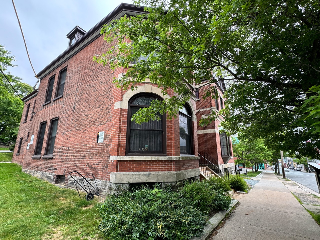 A view of the Grad House exterior looking down Morris Street