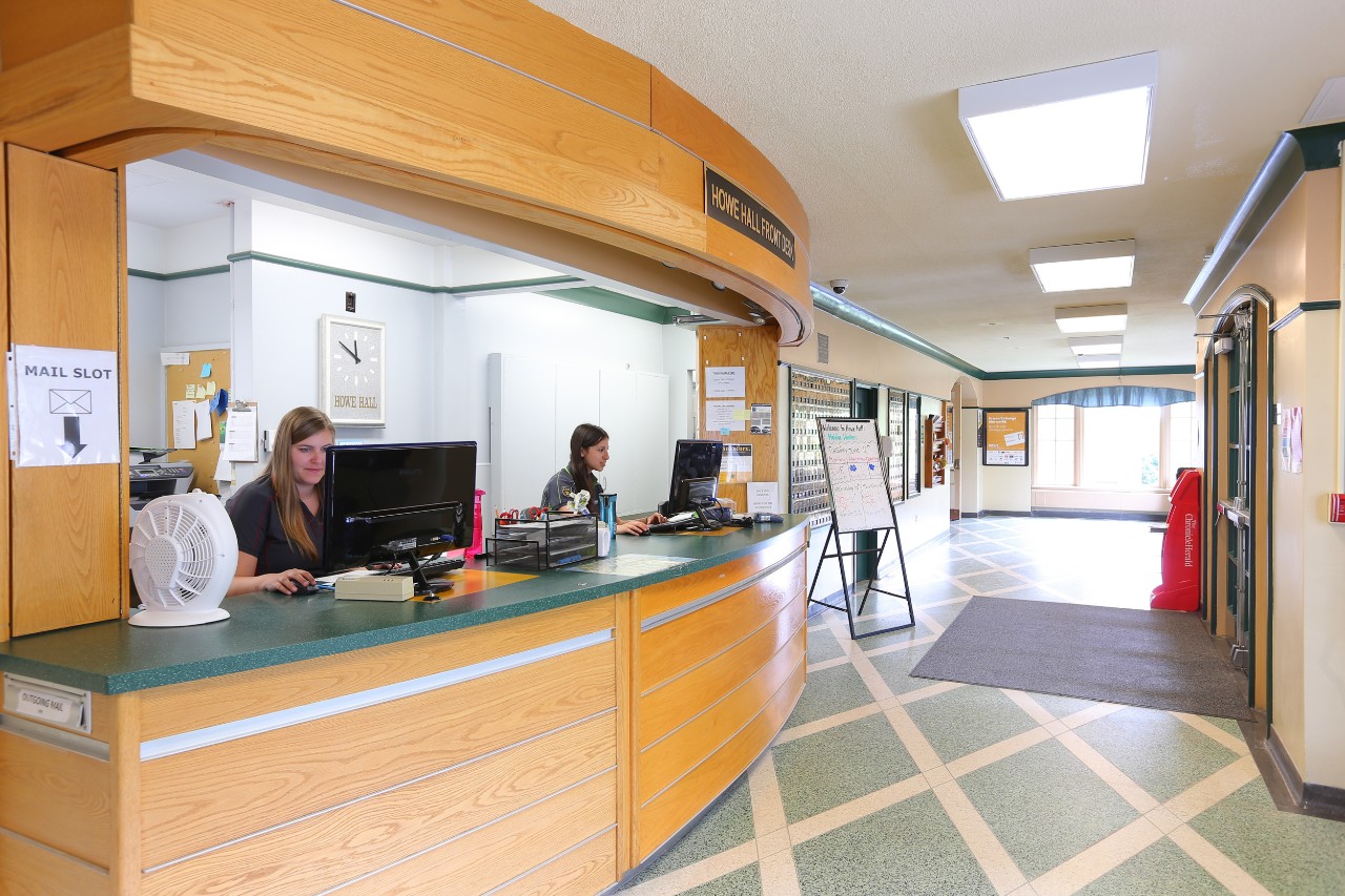 The front desk of Howe Hall in the main lobby