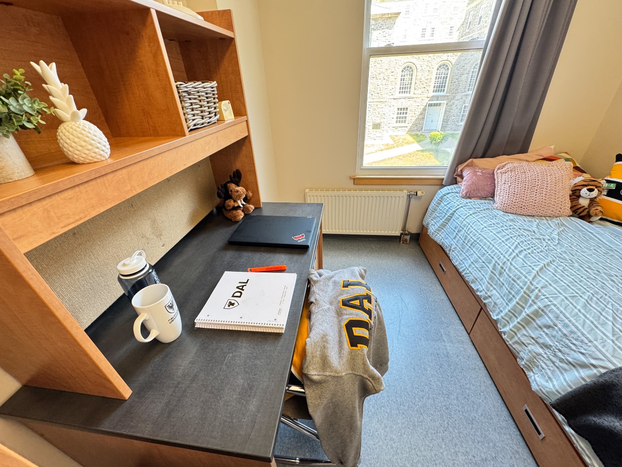 A single room in Fountain House, with a view of the desk