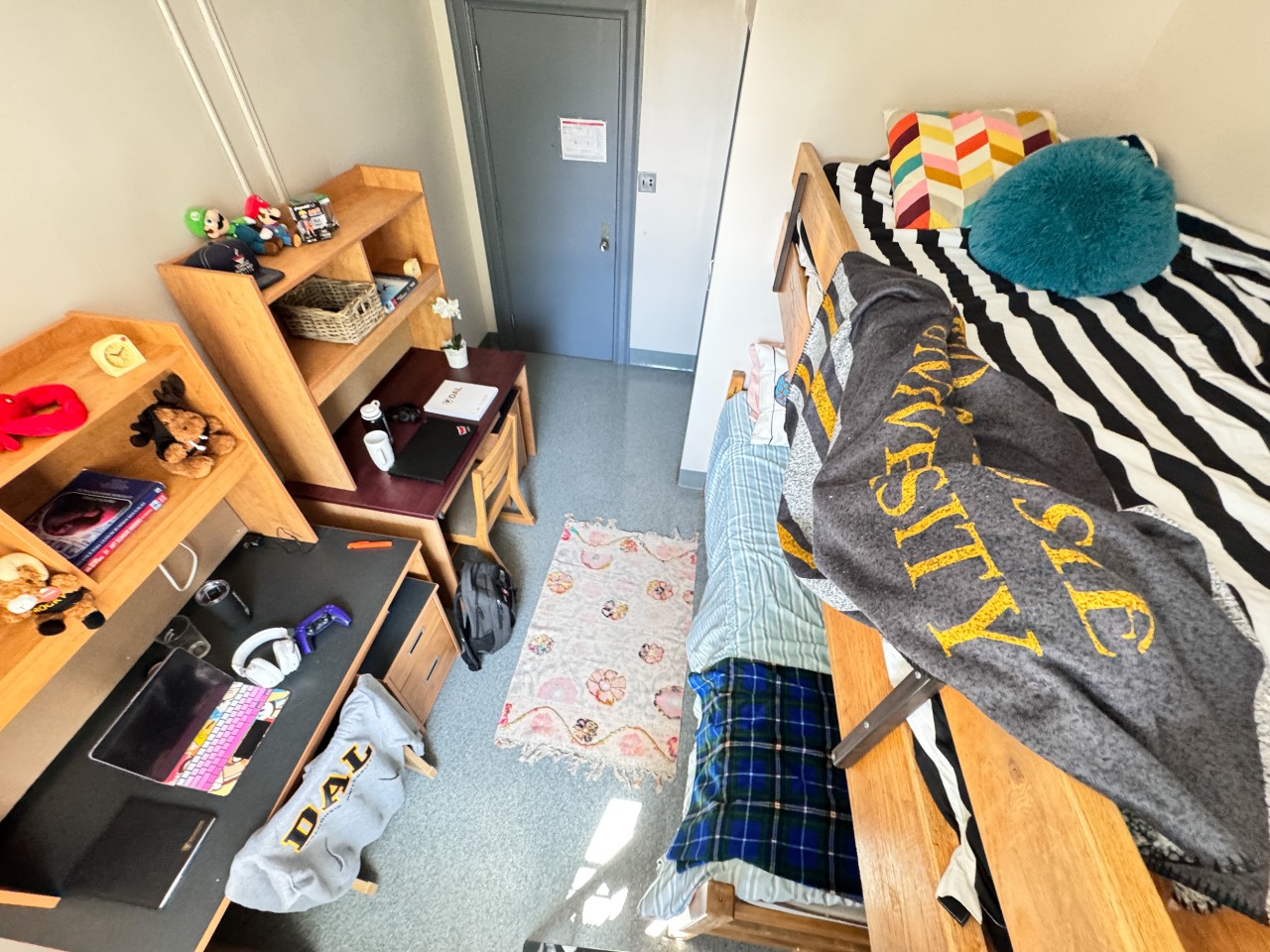 A bunk double room in Bronson House with 2 desks and bunk beds