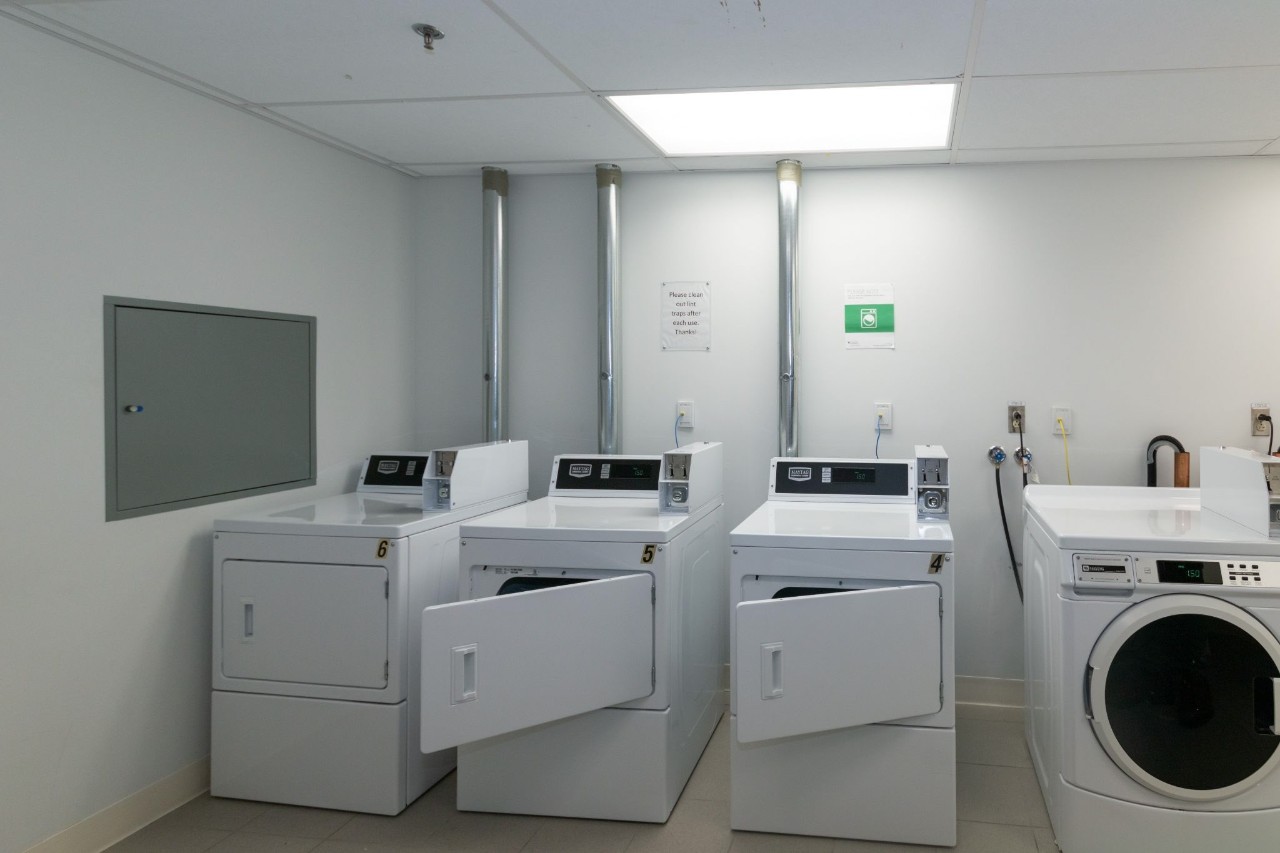 A laundry room in LeMarchant Place