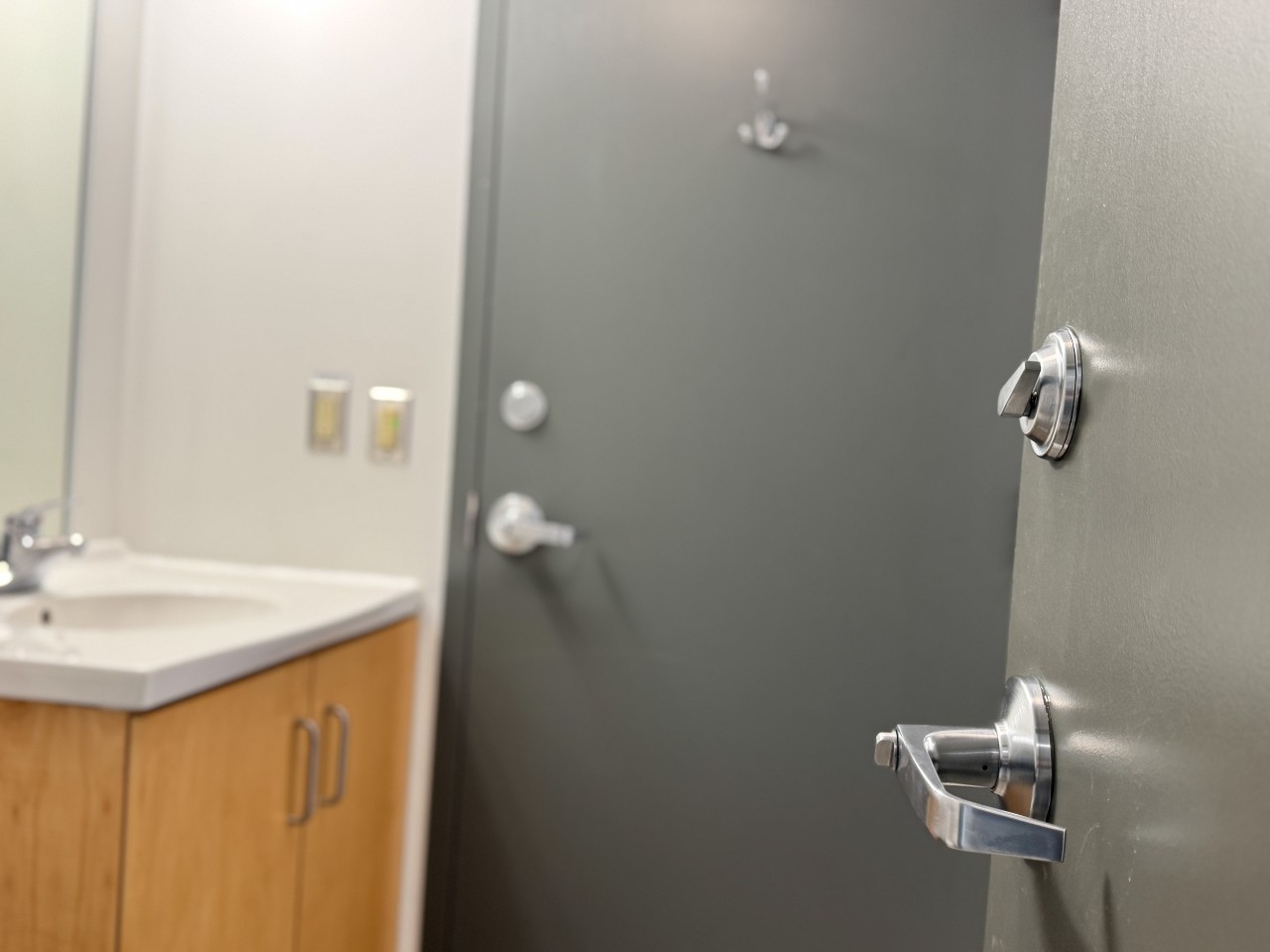 The locking bathroom door handle on a shared bath in LeMarchant Place