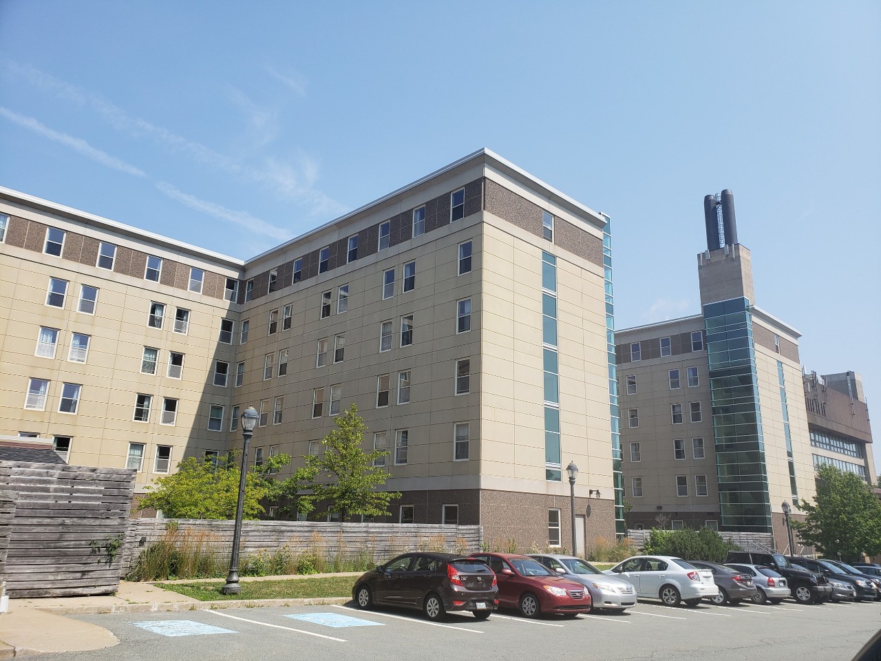 Risley Hall exterior, showing the parking area behind the towers.