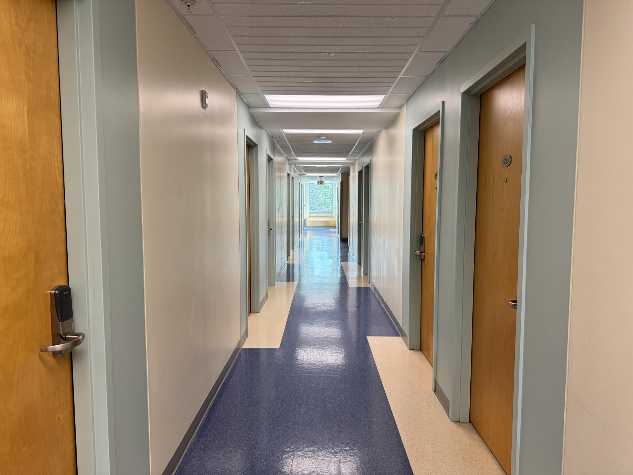 A hallway on a residence floor in Risley Hall