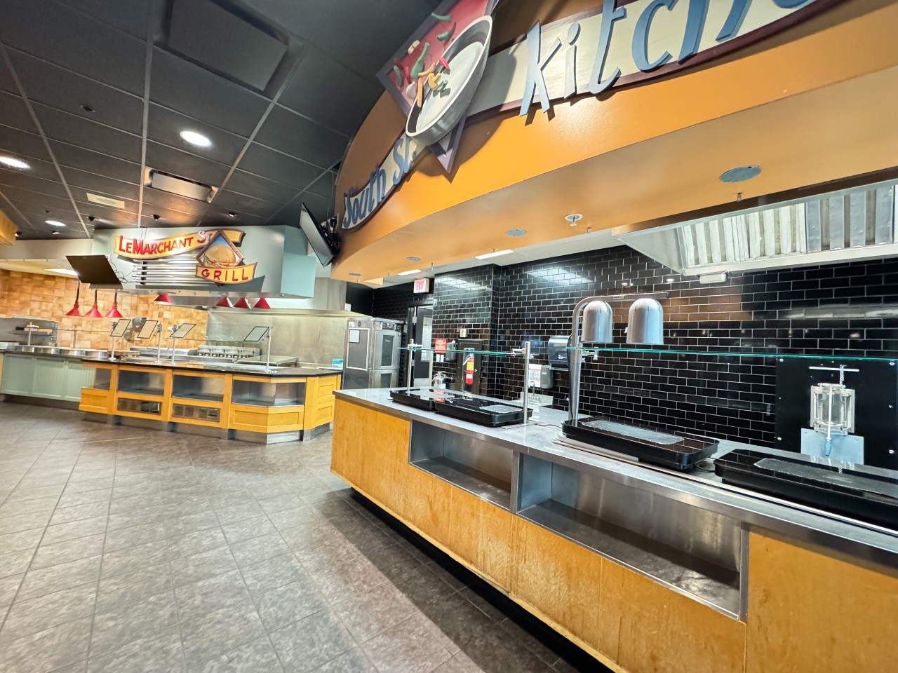 The servery in Risley Hall, with several stations for different foods, with signs above each one